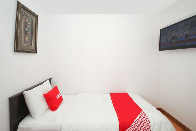 Imagen de la habitación del Hotel OYO 90345 TM. Foto 6