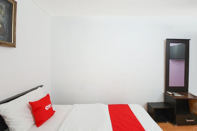 Imagen de la habitación del Hotel OYO 90345 TM. Foto 8