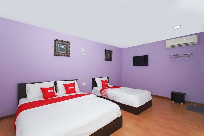 Imagen de la habitación del Hotel OYO 90345 TM. Foto 9