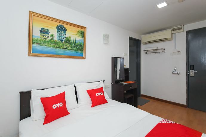 Imagen de la habitación del Hotel OYO 90345 TM. Foto 12
