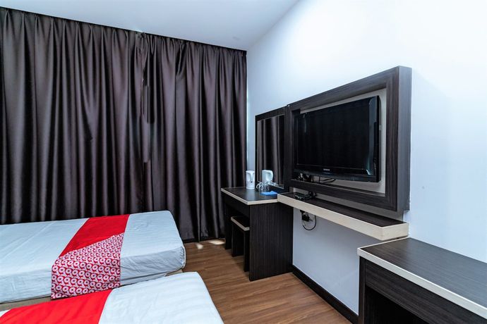 Imagen de la habitación del Hotel OYO 90375 Reggae Inn. Foto 5