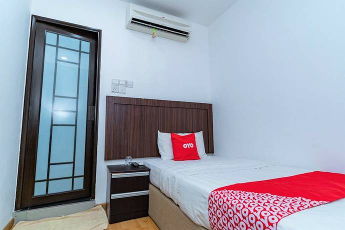 Imagen de la habitación del Hotel OYO 90375 Reggae Inn. Foto 6