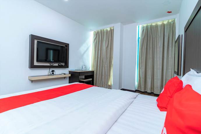 Imagen de la habitación del Hotel OYO 90375 Reggae Inn. Foto 7