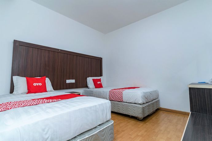 Imagen de la habitación del Hotel OYO 90375 Reggae Inn. Foto 9