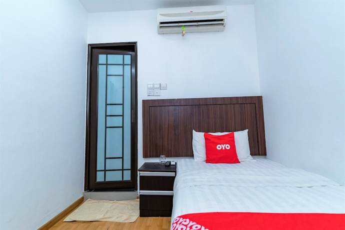 Imagen de la habitación del Hotel OYO 90375 Reggae Inn. Foto 11