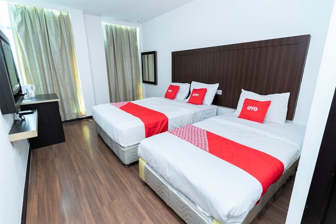 Imagen de la habitación del Hotel OYO 90375 Reggae Inn. Foto 12
