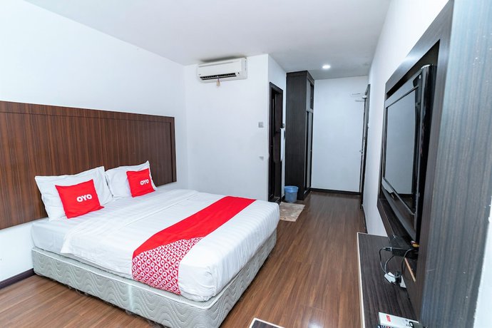 Imagen de la habitación del Hotel OYO 90375 Reggae Inn. Foto 15
