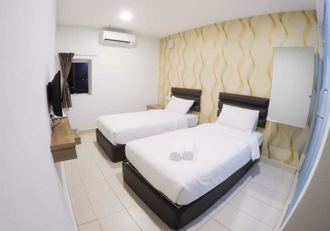 Imagen de la habitación del Hotel OYO 90385 H3. Foto 2