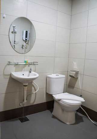 Imagen de la habitación del Hotel OYO 90385 H3. Foto 3