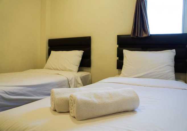 Imagen de la habitación del Hotel OYO 90385 H3. Foto 5