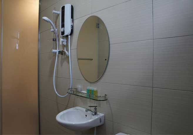 Imagen de la habitación del Hotel OYO 90385 H3. Foto 7