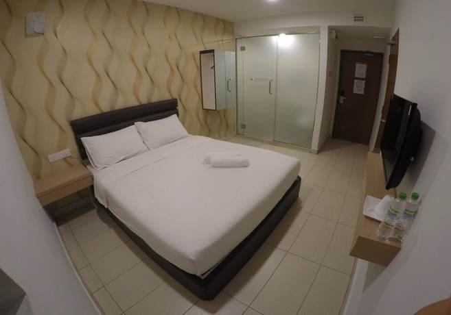 Imagen de la habitación del Hotel OYO 90385 H3. Foto 9