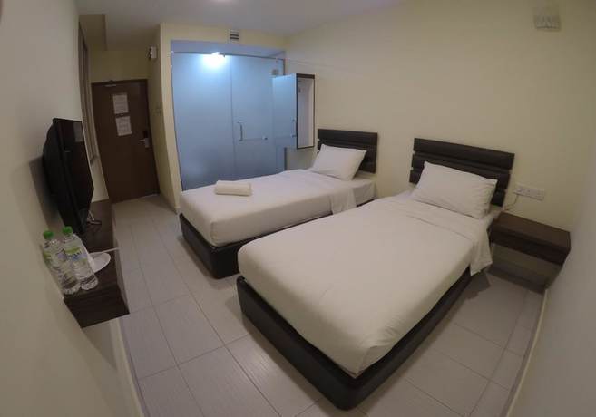 Imagen de la habitación del Hotel OYO 90385 H3. Foto 11