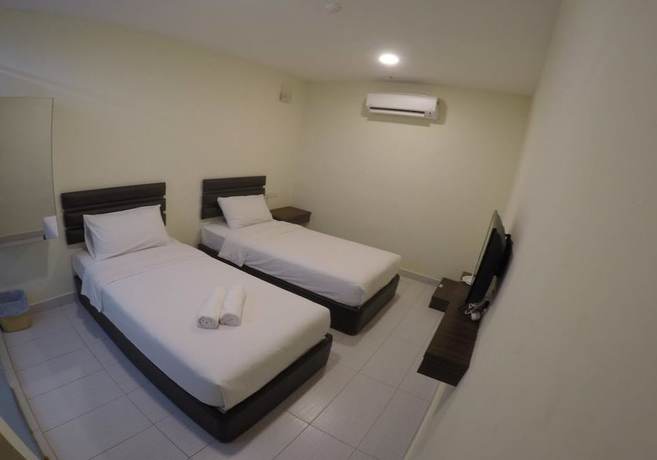 Imagen de la habitación del Hotel OYO 90385 H3. Foto 12