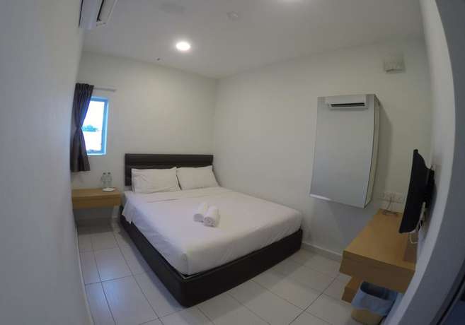 Imagen de la habitación del Hotel OYO 90385 H3. Foto 14