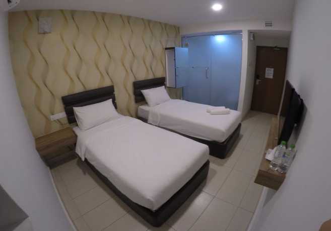 Imagen de la habitación del Hotel OYO 90385 H3. Foto 16