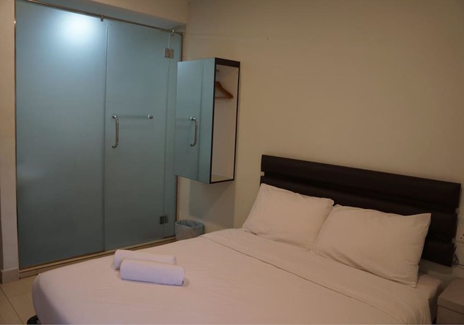 Imagen de la habitación del Hotel OYO 90385 H3. Foto 17