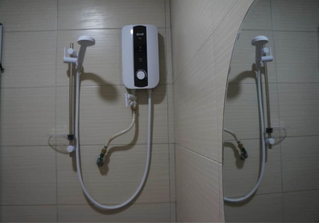 Imagen de la habitación del Hotel OYO 90385 H3. Foto 18