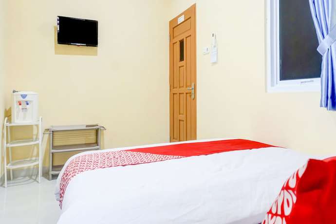 Imagen de la habitación del Hotel OYO 90389 Pondok Vanilla. Foto 8