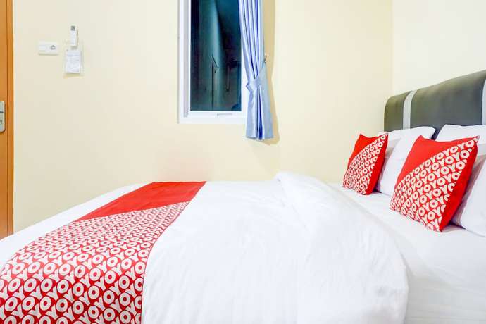 Imagen de la habitación del Hotel OYO 90389 Pondok Vanilla. Foto 9