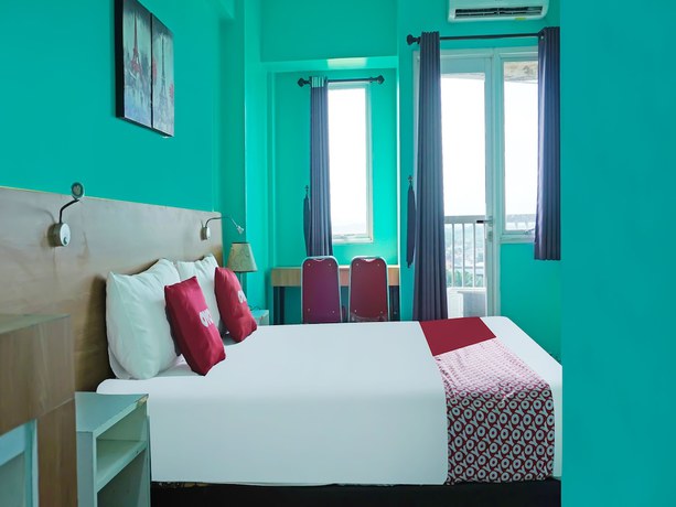 Imagen de la habitación del Hotel OYO 90391 Gkitroom. Foto 11