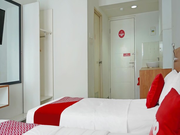 Imagen de la habitación del Hotel OYO 90391 Gkitroom. Foto 13