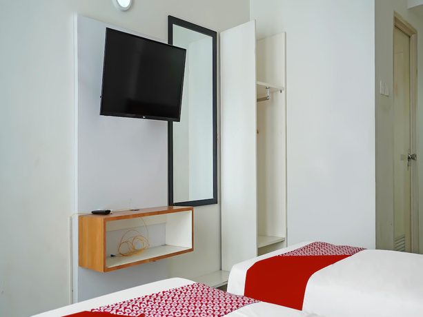Imagen de la habitación del Hotel OYO 90391 Gkitroom. Foto 15