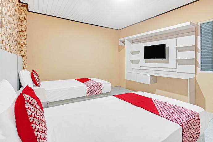 Imagen de la habitación del Hotel OYO 90399 Box House. Foto 4