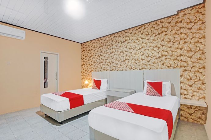 Imagen de la habitación del Hotel OYO 90399 Box House. Foto 5