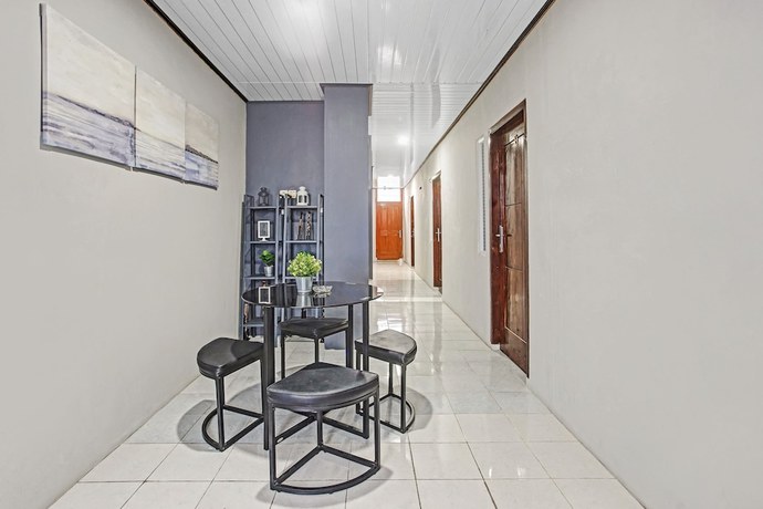 Imagen de los interiores del Hotel OYO 90399 Box House. Foto 15