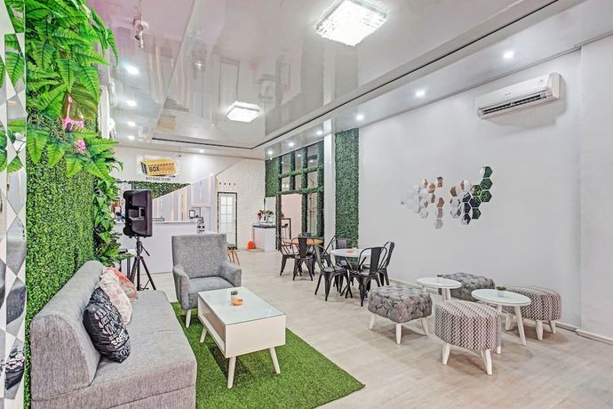 Imagen de los interiores del Hotel OYO 90399 Box House. Foto 16