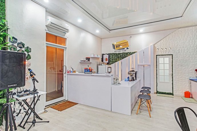 Imagen de los interiores del Hotel OYO 90399 Box House. Foto 17