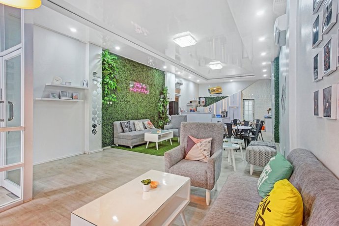 Imagen de los interiores del Hotel OYO 90399 Box House. Foto 19