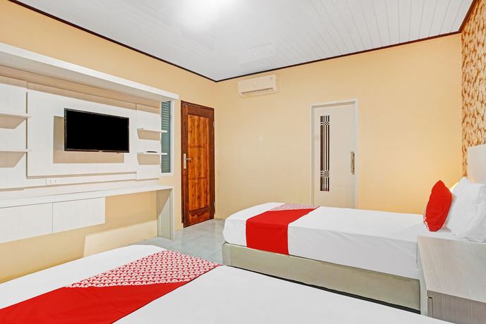 Imagen de la habitación del Hotel OYO 90399 Box House. Foto 9