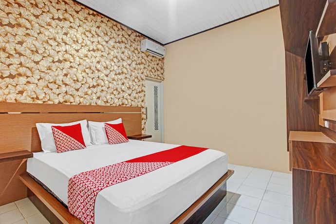 Imagen de la habitación del Hotel OYO 90399 Box House. Foto 10