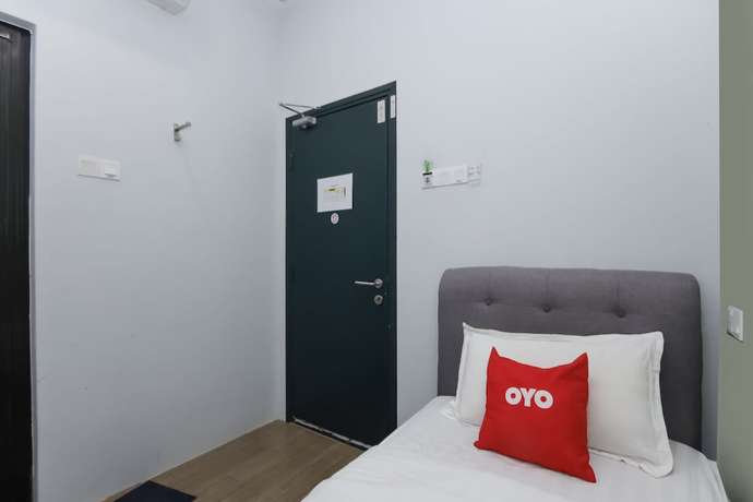 Imagen de la habitación del Hotel OYO 90399 Green Home. Foto 4