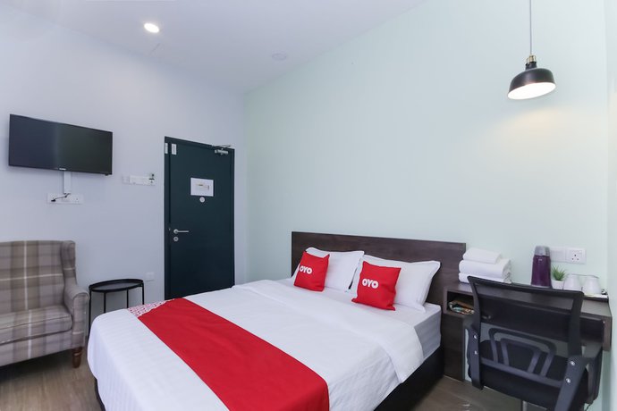 Imagen de la habitación del Hotel OYO 90399 Green Home. Foto 5