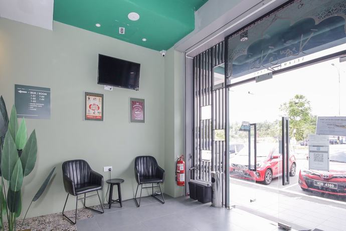 Imagen de los interiores del Hotel OYO 90399 Green Home. Foto 17