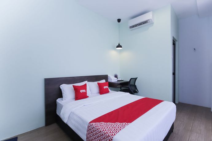Imagen de la habitación del Hotel OYO 90399 Green Home. Foto 8