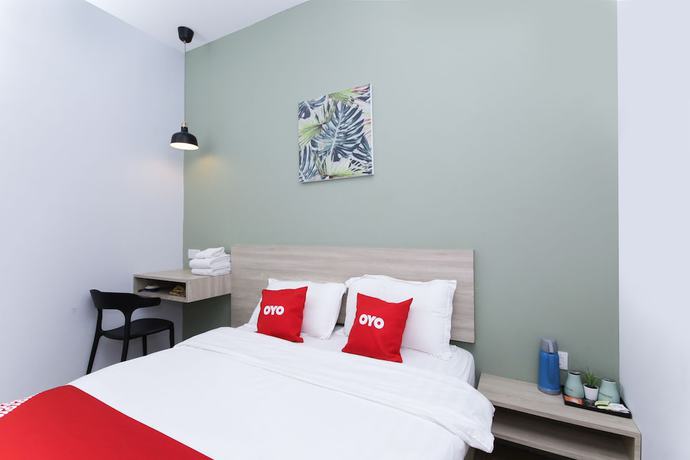 Imagen de la habitación del Hotel OYO 90399 Green Home. Foto 9