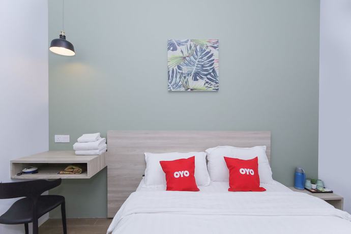 Imagen de la habitación del Hotel OYO 90399 Green Home. Foto 10