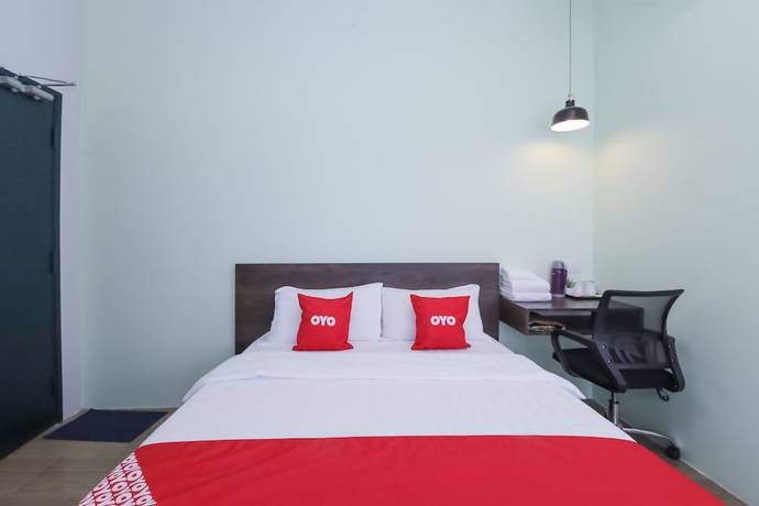 Imagen de la habitación del Hotel OYO 90399 Green Home. Foto 11