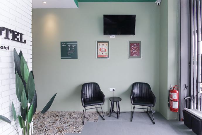 Imagen de los interiores del Hotel OYO 90399 Green Home. Foto 19