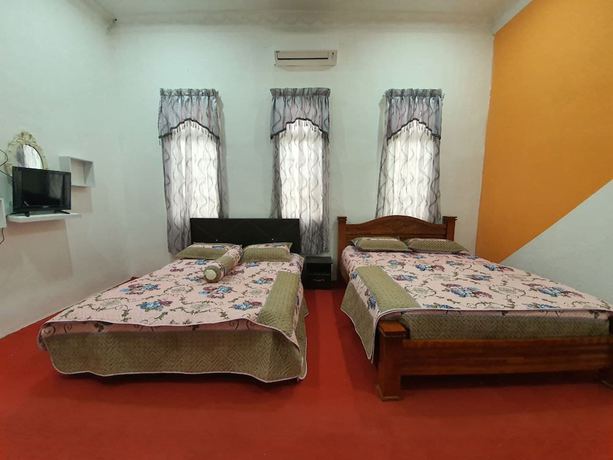 Imagen de la habitación del Hotel OYO 90404 Z Dirgahayu 313. Foto 11