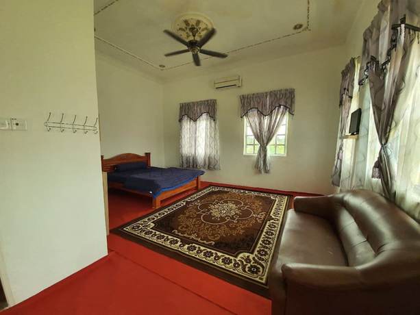 Imagen de la habitación del Hotel OYO 90404 Z Dirgahayu 313. Foto 13