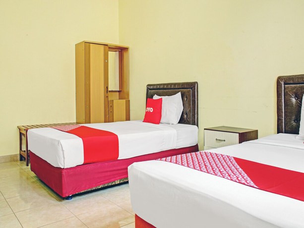 Imagen de la habitación del Hotel OYO 90423 Aman. Foto 13