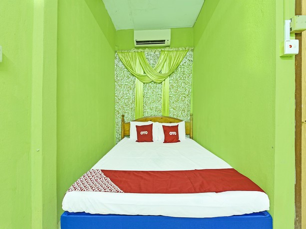 Imagen de la habitación del Hotel OYO 90454 Haza Harmoni Guesthouse. Foto 11