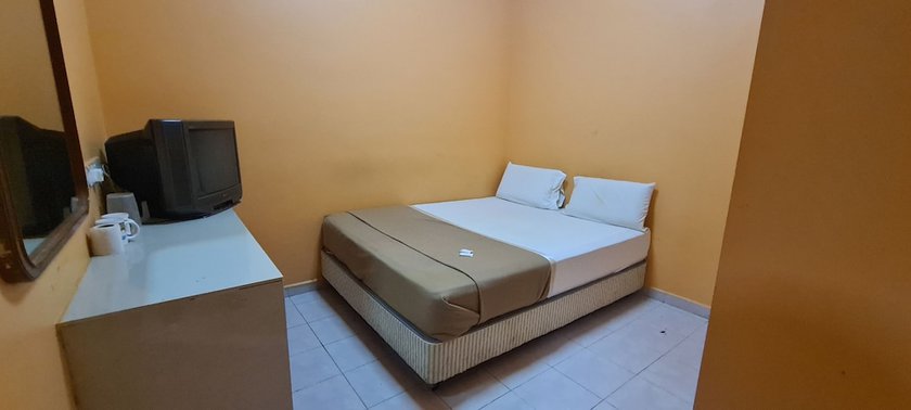 Imagen de la habitación del Hotel OYO 90461 Melawati Times Inn. Foto 11