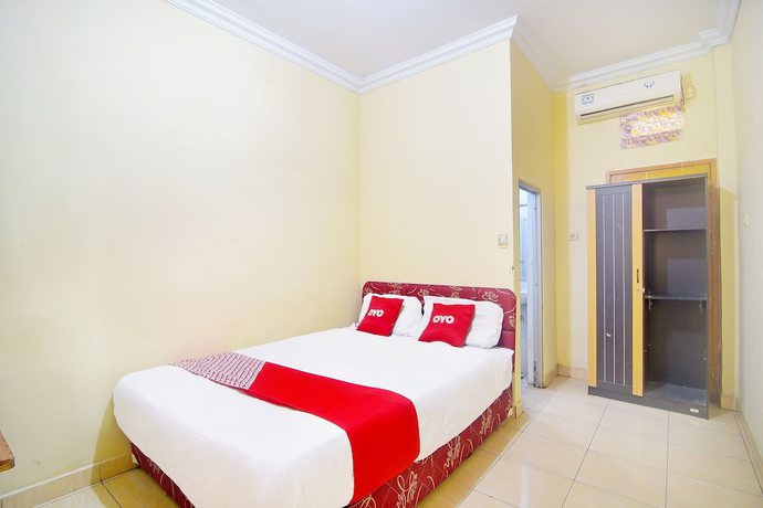 Imagen de la habitación del Hotel OYO 90463 A2b Guesthouse. Foto 3