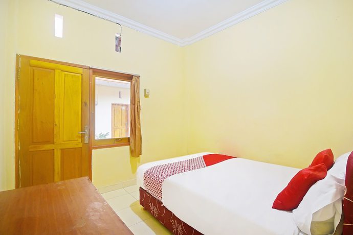 Imagen de la habitación del Hotel OYO 90463 A2b Guesthouse. Foto 4